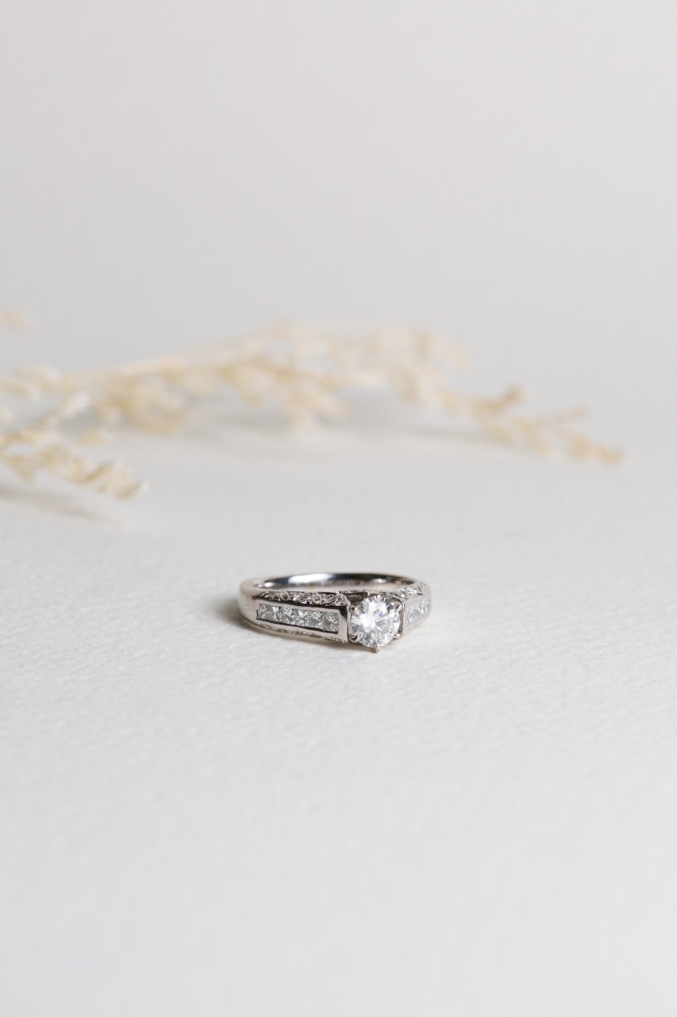 Antique style white gold engagement ring