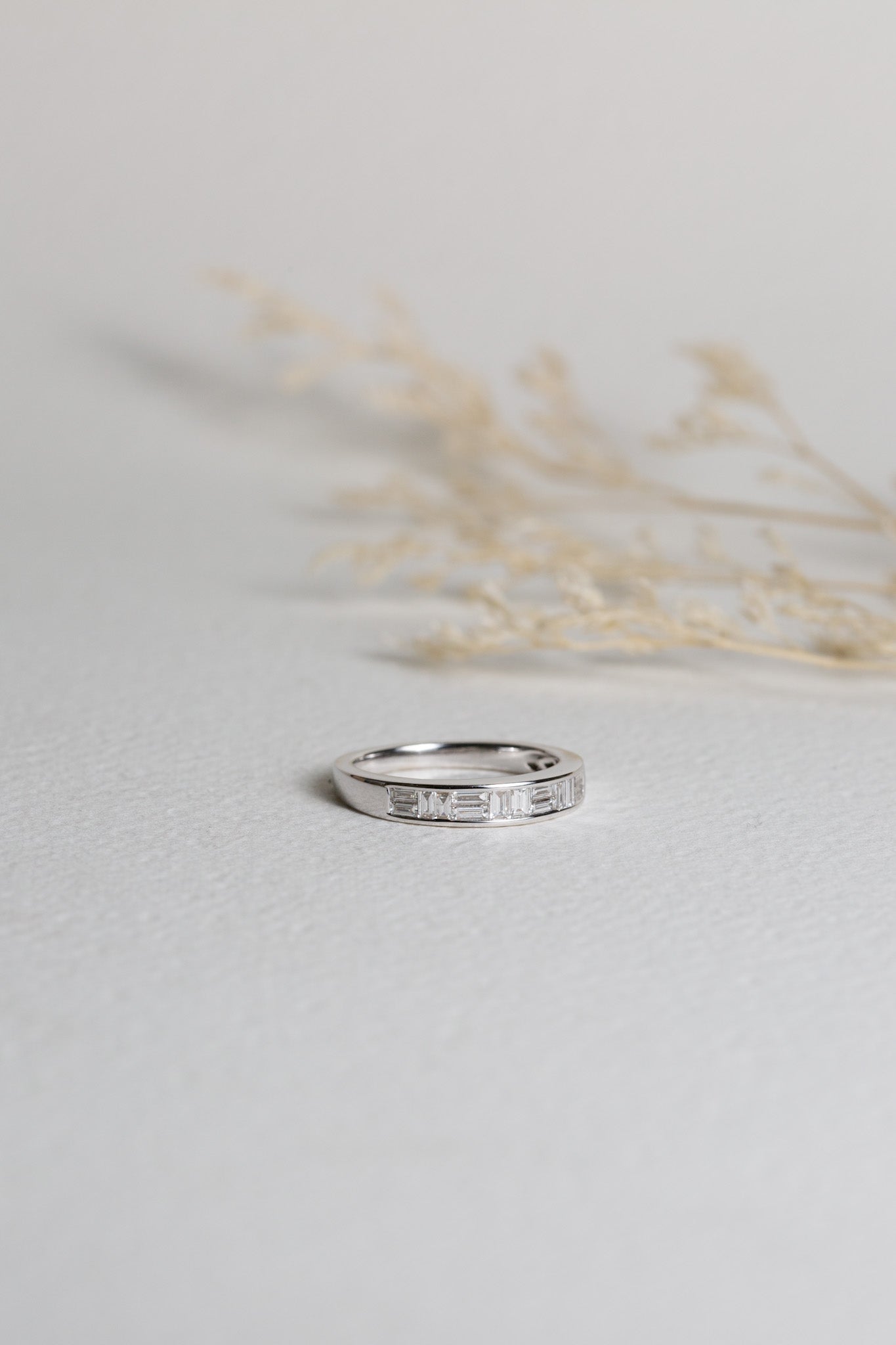 White gold wedding ring with baguette-cut diamonds