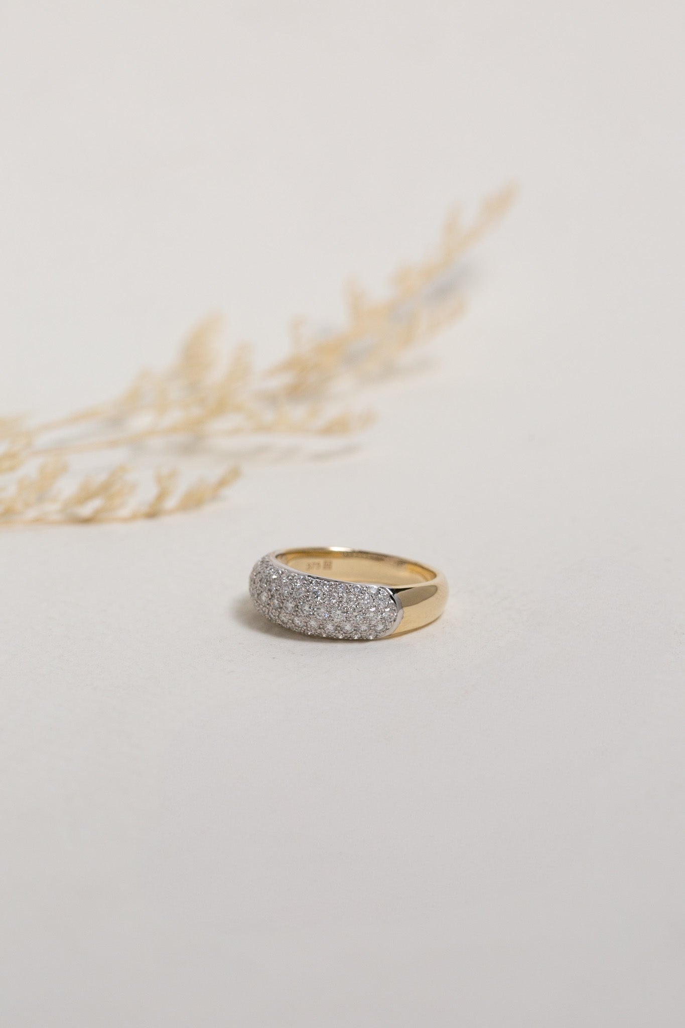 Domed gold dress ring set with 1ct of diamonds in the top