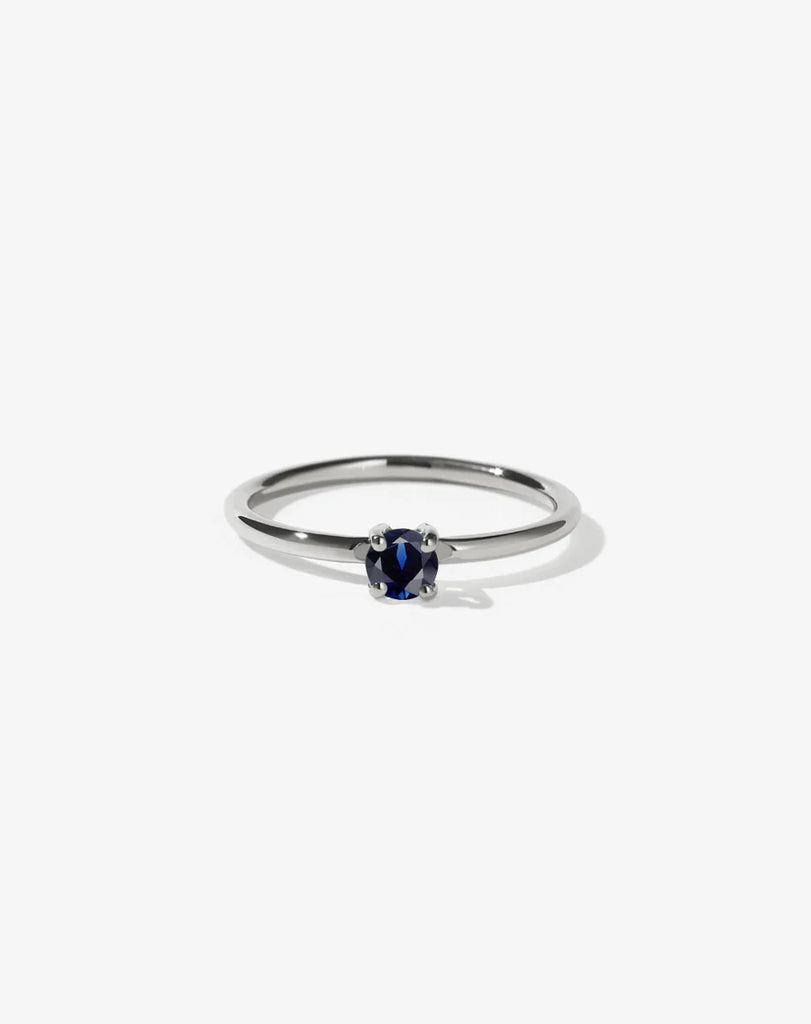 Dainty silver ring set with a single sapphire