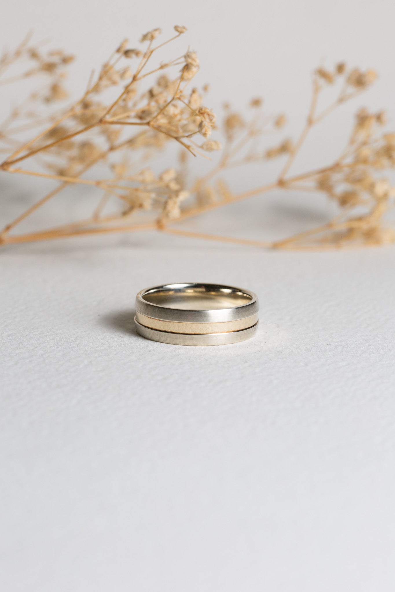 Mens white and yellow gold wedding ring