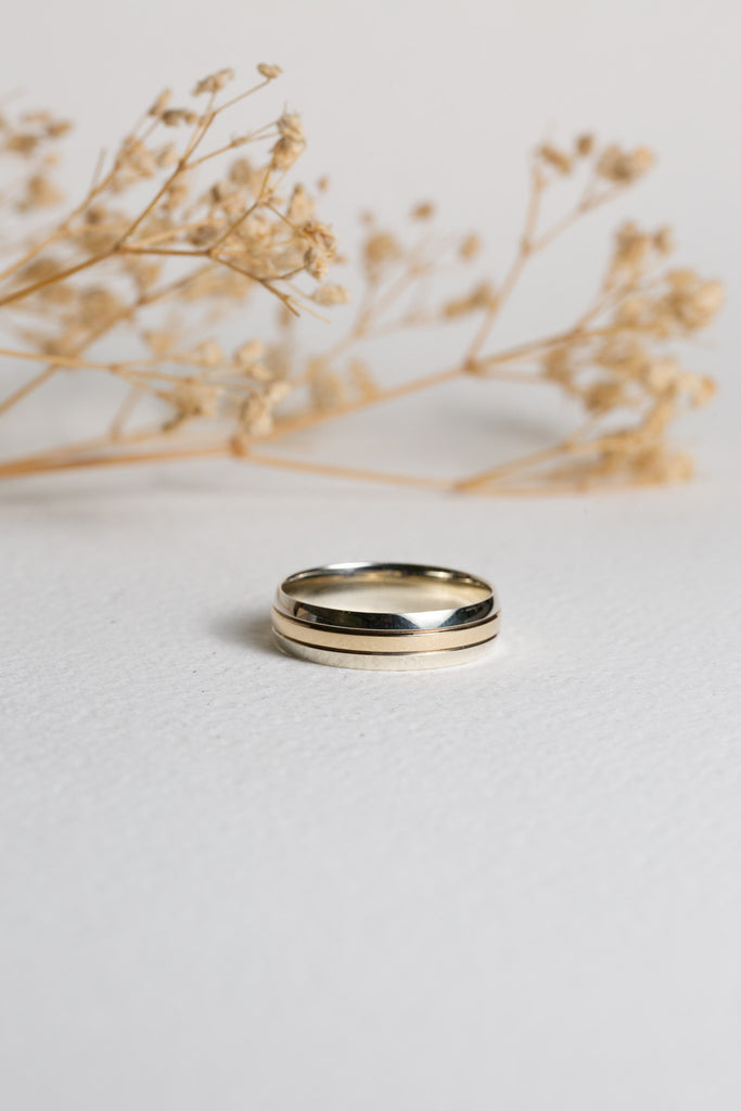 Mens modern white gold and yellow gold two-tone wedding ring