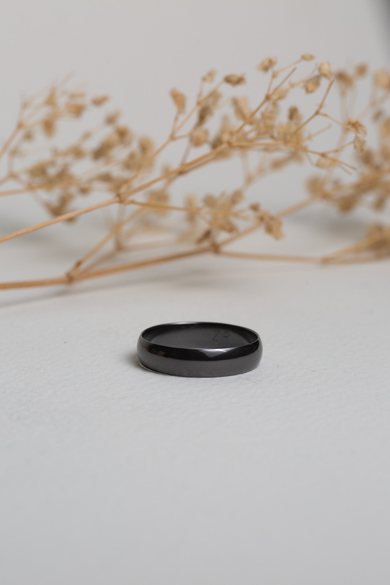 Gents plain black polished zirconium ring