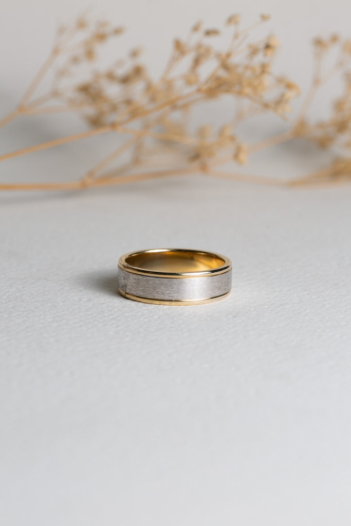 Mens bi-tone wedding band with a textured finish