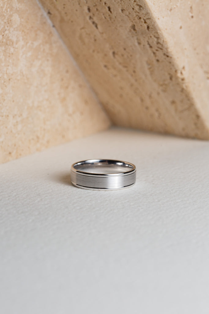 Mens white gold wedding ring with a brushed finish through the centre