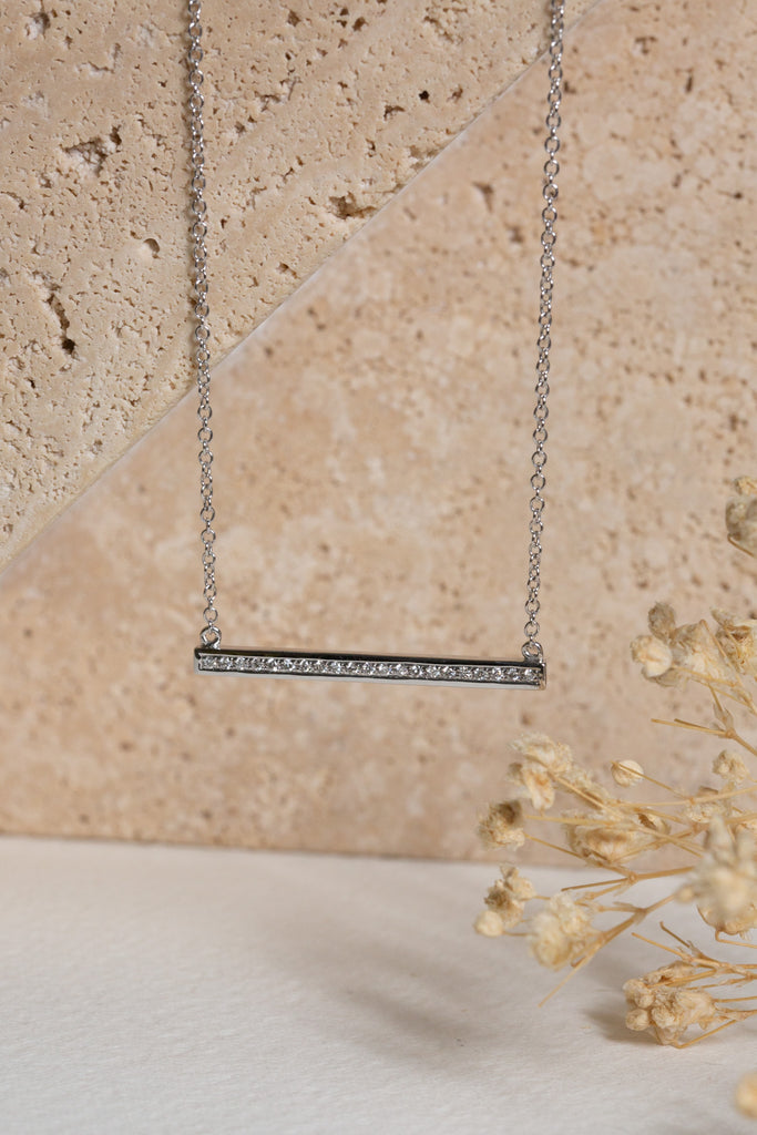 White gold necklace with a bar of diamonds