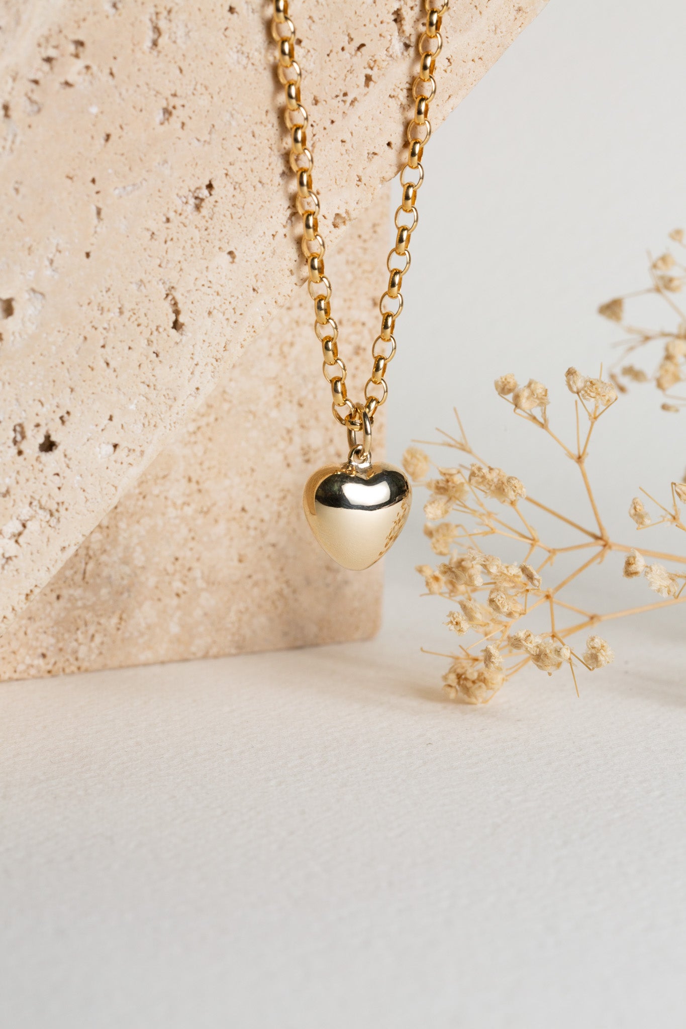 Gold puff heart on a belcher chain