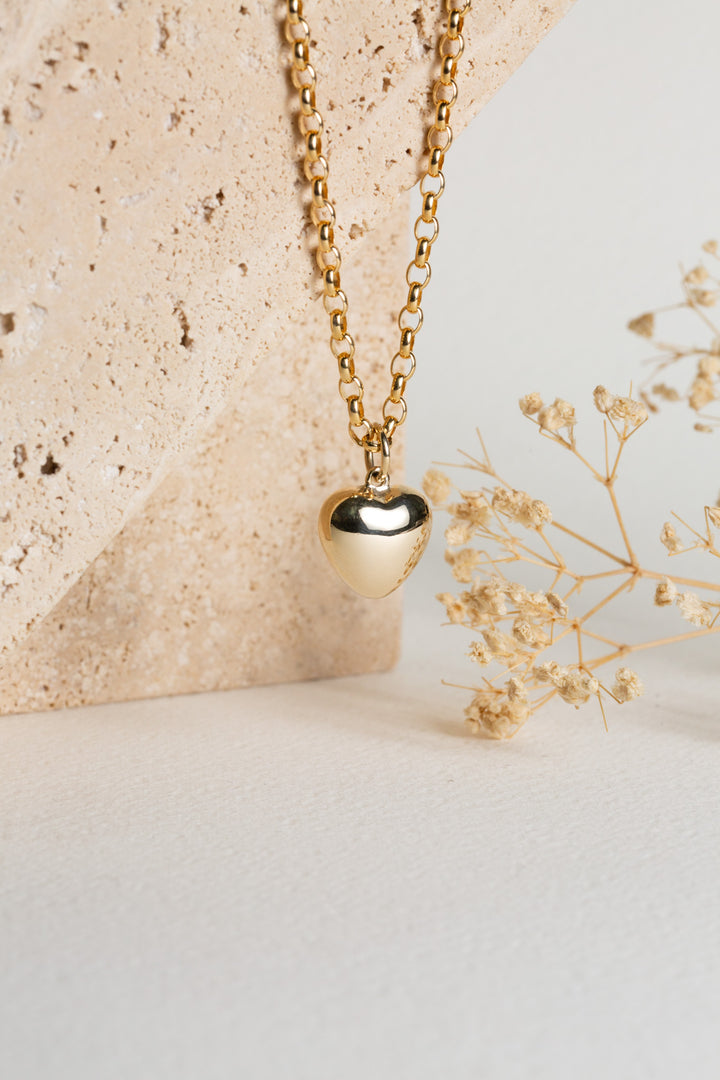 Gold puff heart on a belcher chain