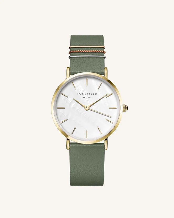 Ladies gold watch with green leather strap
