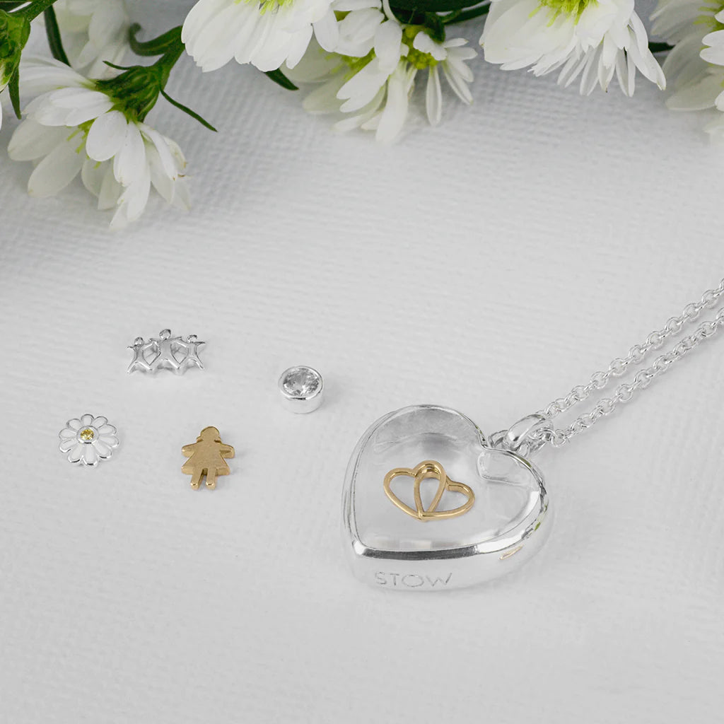 Silver Stow heart shaped locket with charms inside