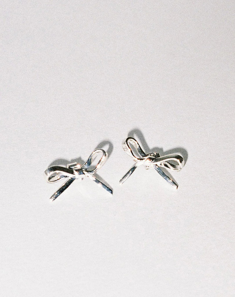 Silver bow stud earrings