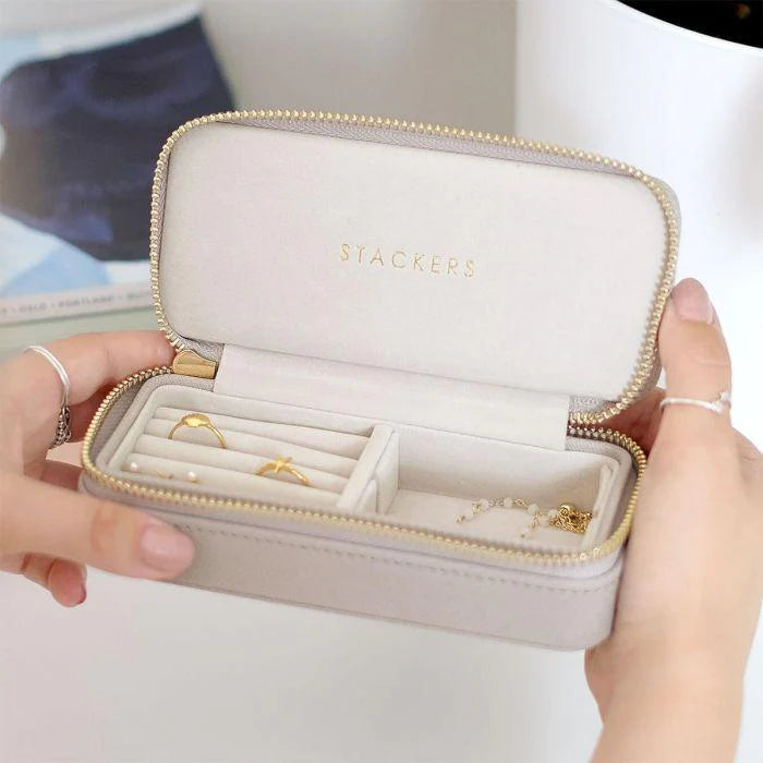 Travel-sized jewellery box with sections for rings and earrings