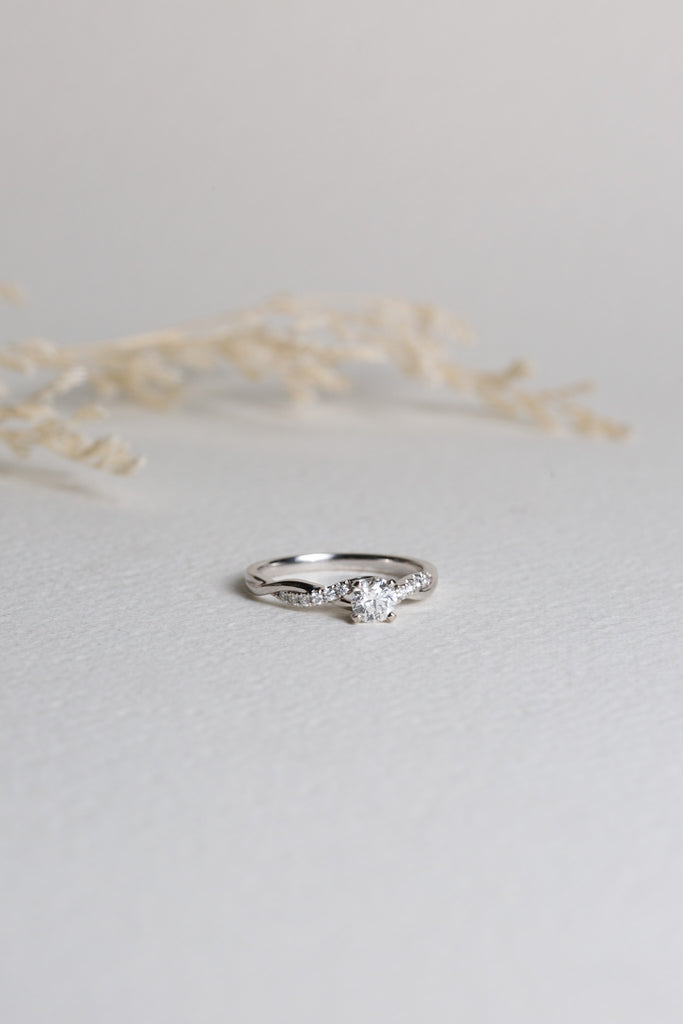 White gold diamond engagement ring with entwined shoulders