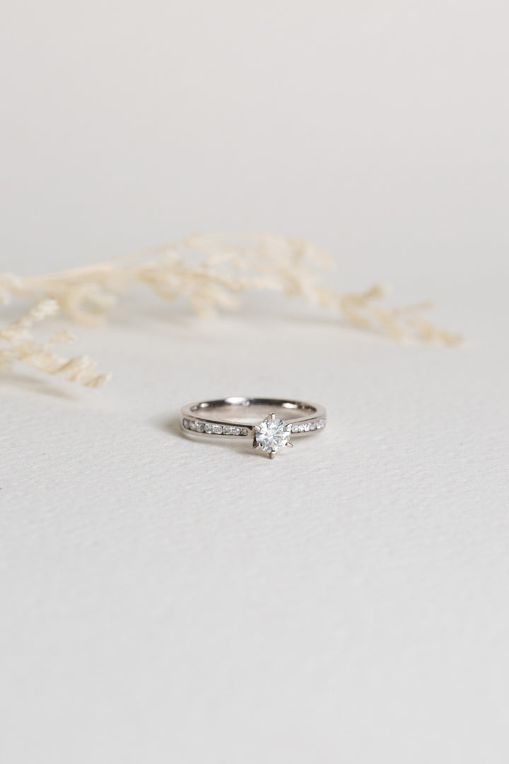 White gold diamond engagement ring with shoulder diamonds