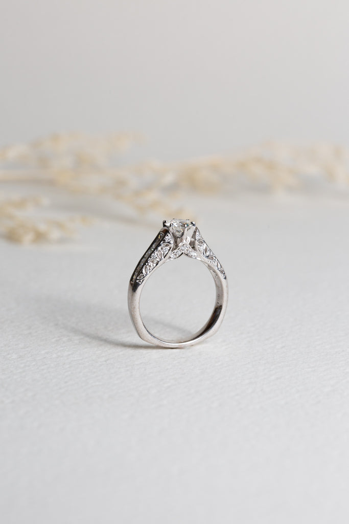 White gold diamond engagement ring in an antique design