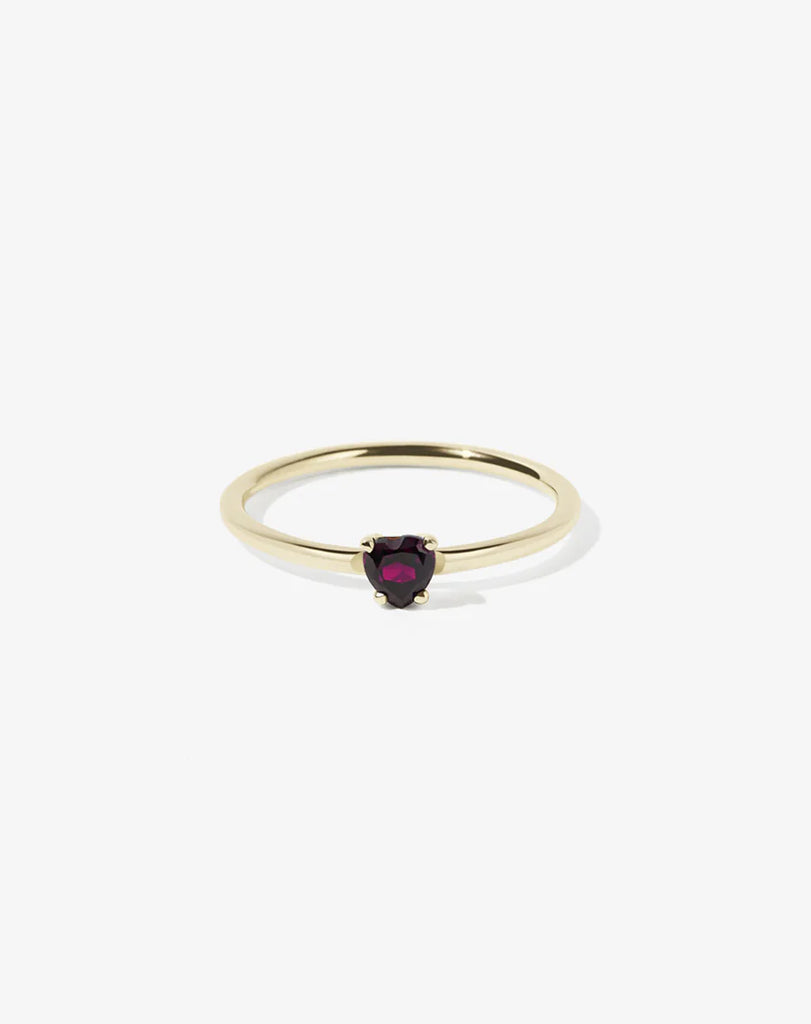 Gold ring with a heart shaped rhodolite garnet