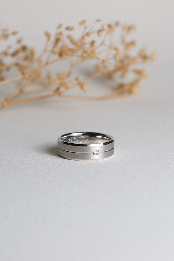 Mens white gold and diamond wedding band
