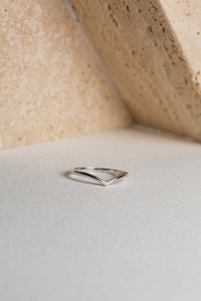 Plain white gold wishbone-shaped wedding ring
