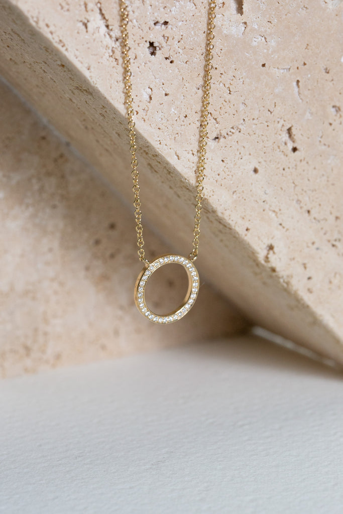 Diamond circle necklace set in 9ct gold