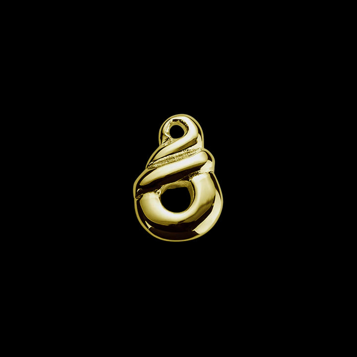 Gold koru twist charm