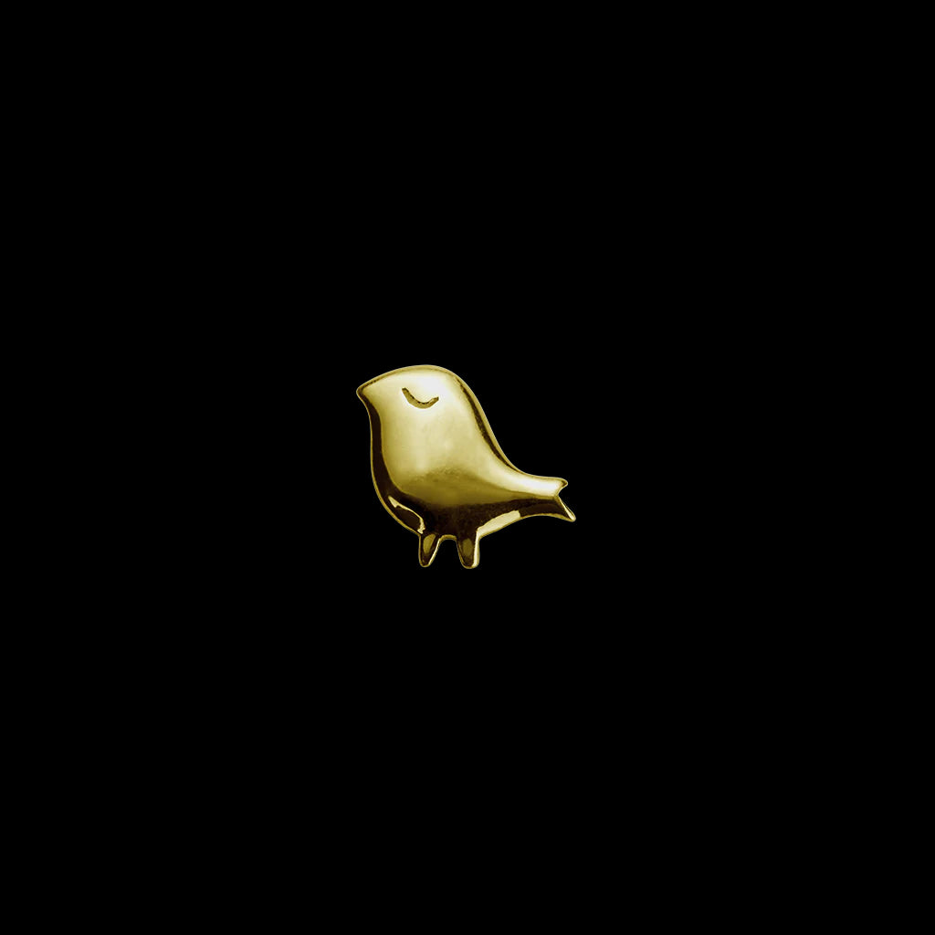 Gold bird charm