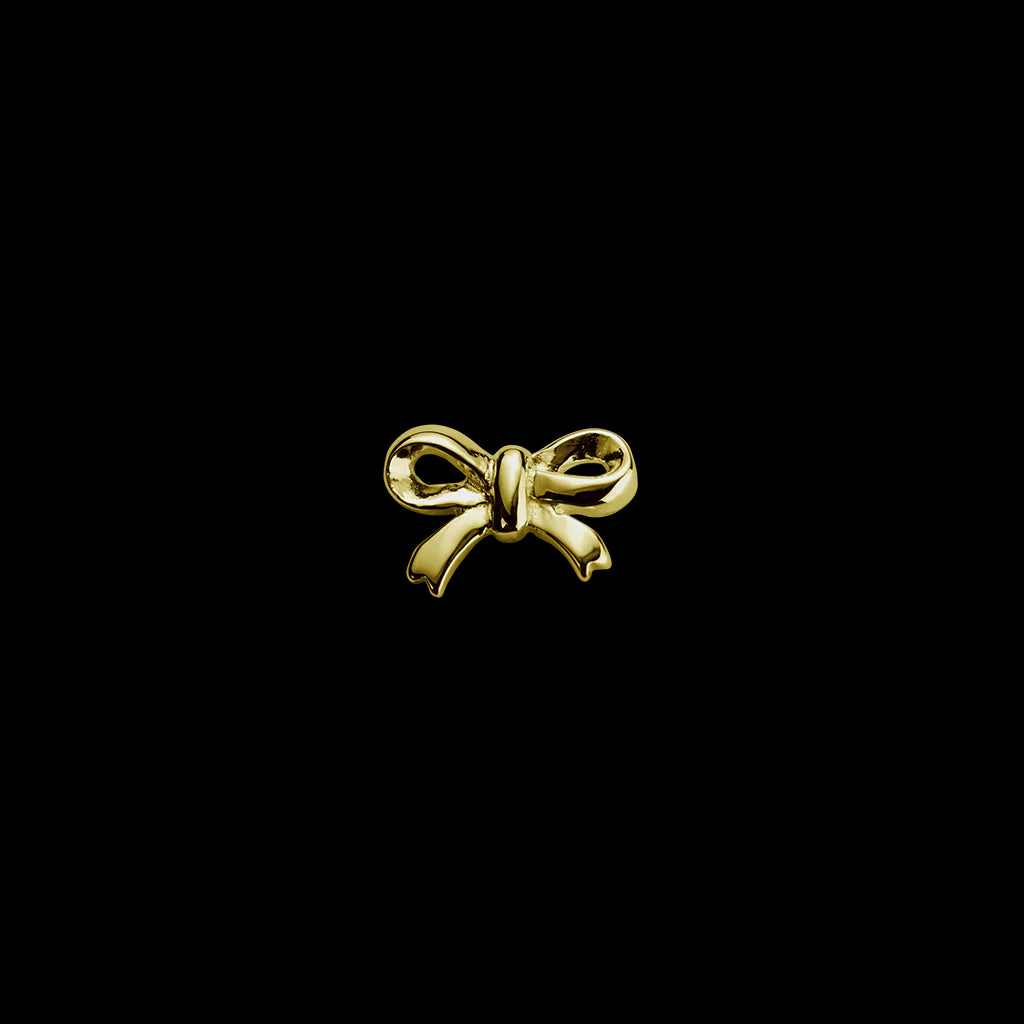 Gold bow charm