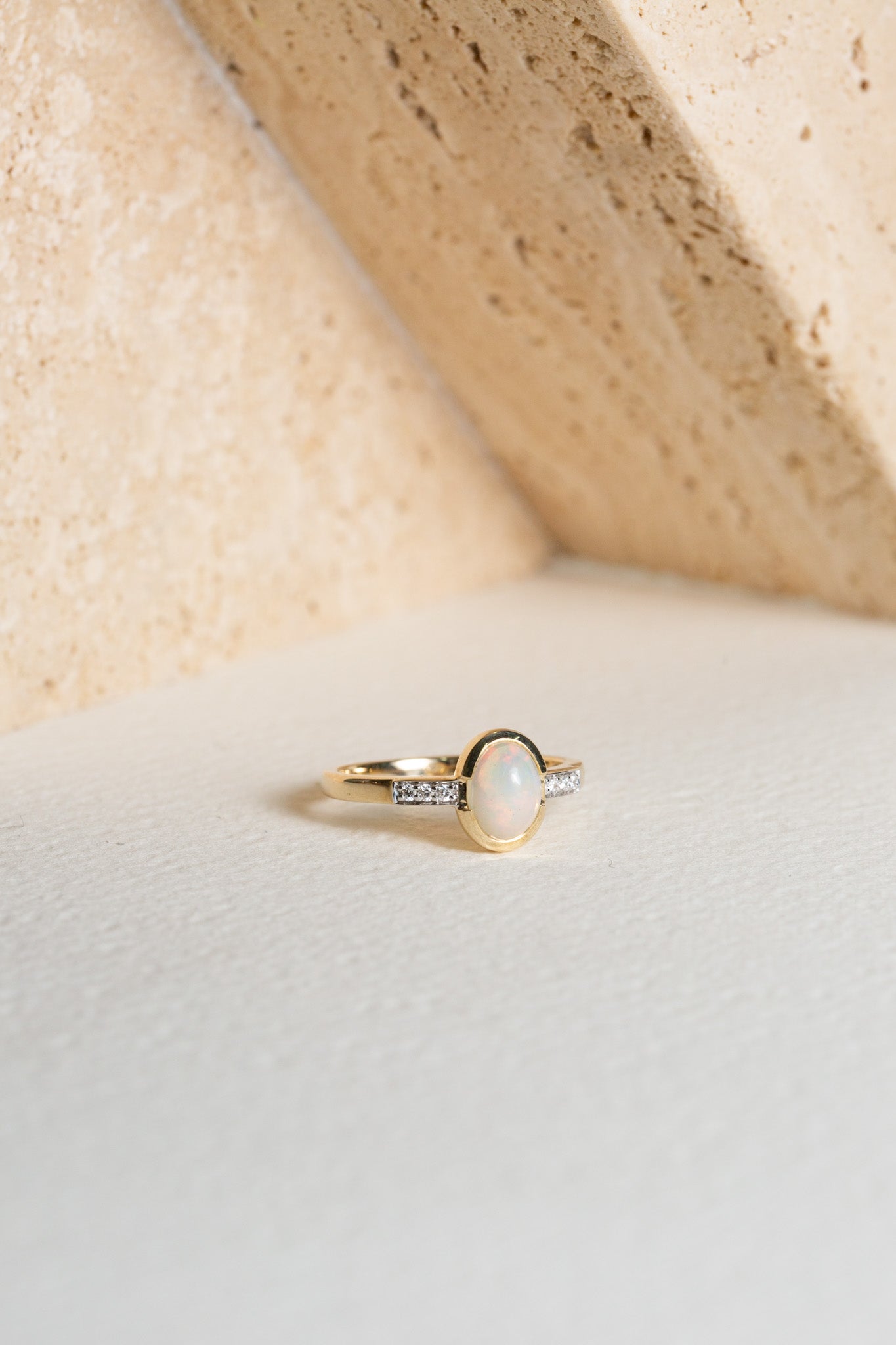 Opal and diamond ring, set in gold