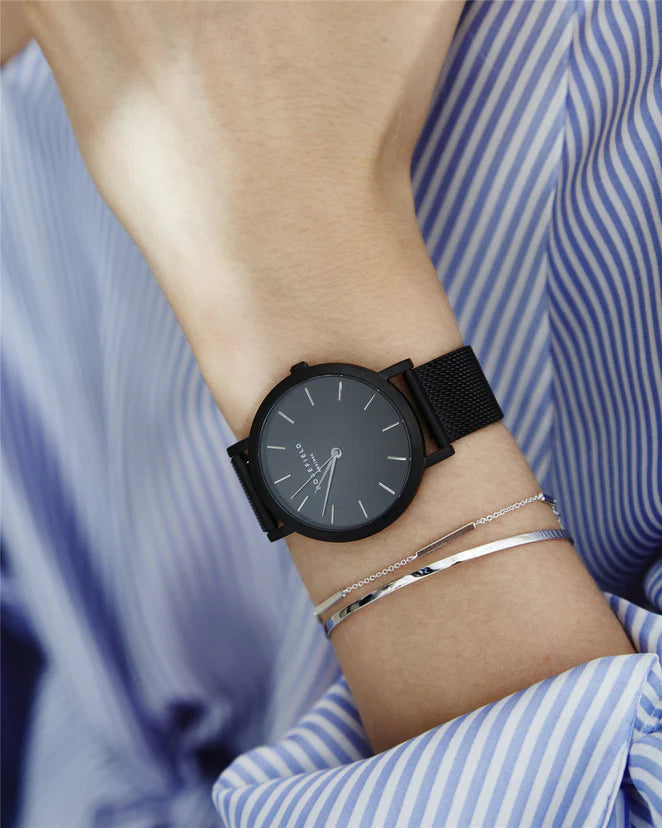 Rosefield The Mercer watch with black strap, case, and black dial