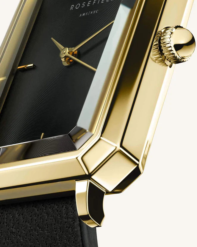 Ladies gold octagon watch with black dial