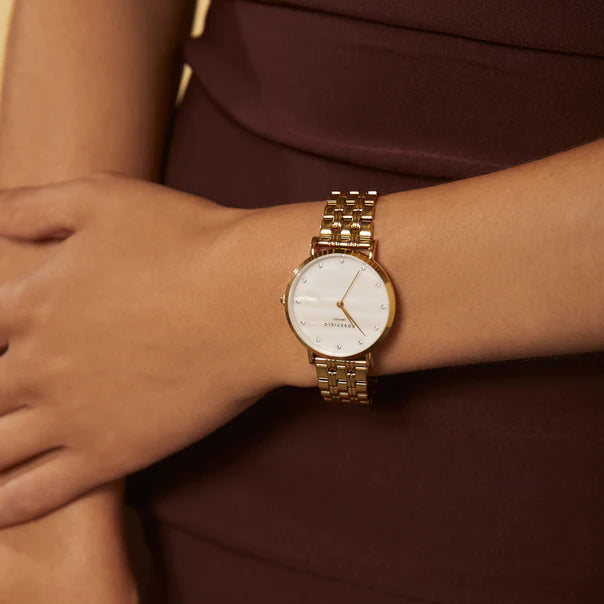 Ladies large gold watch with crystal dial