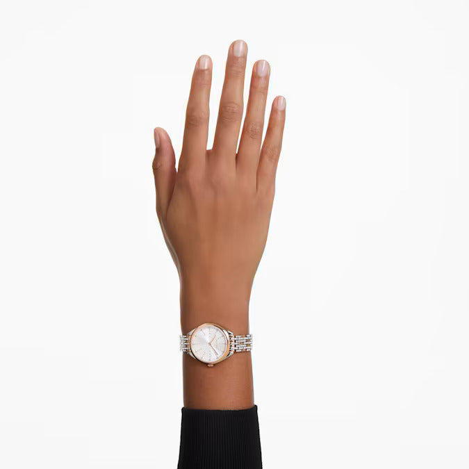 Rose Gold Swarovski Attract Watch shown on a model