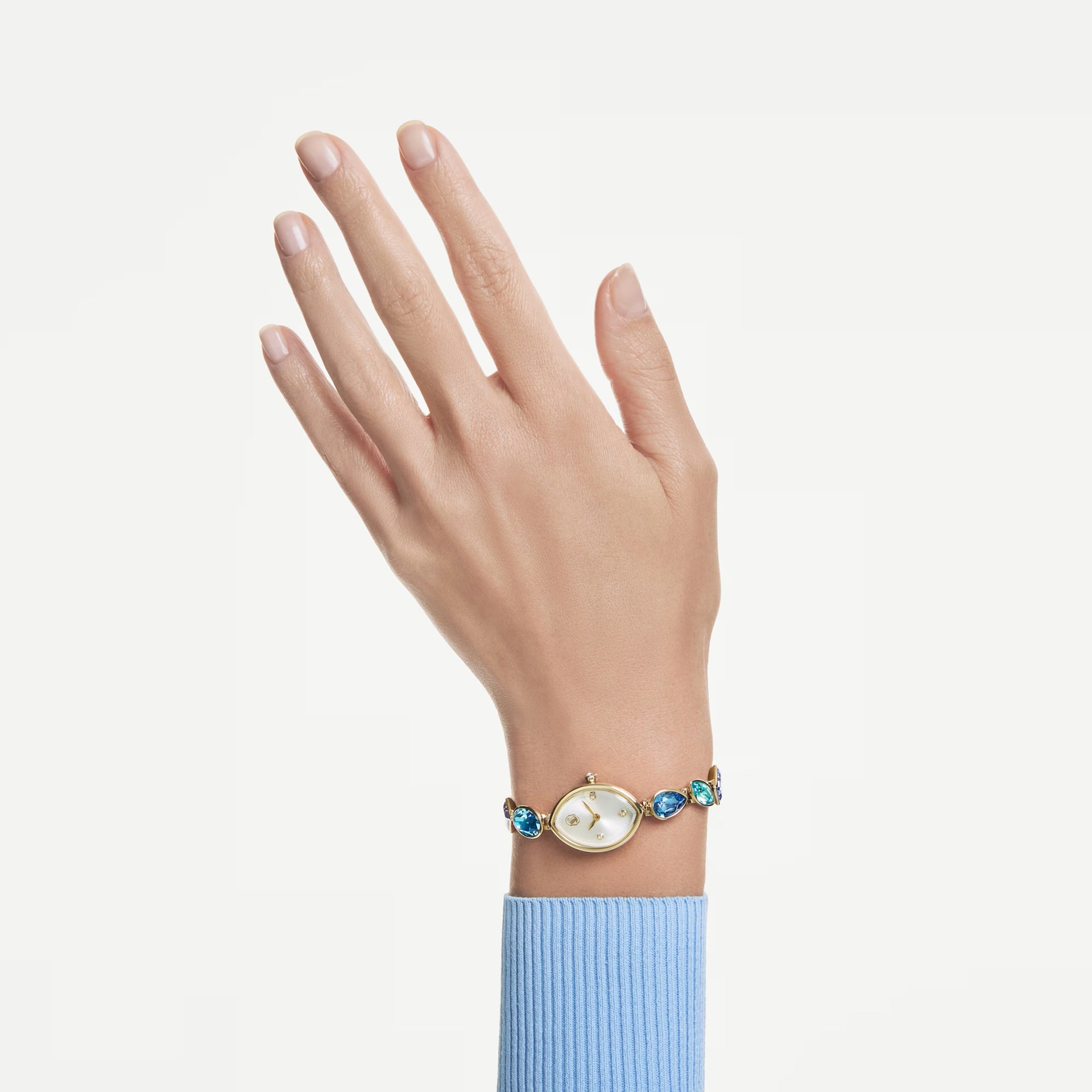 Swarovski Gema watch worn on wrist, coloured crystal bracelet
