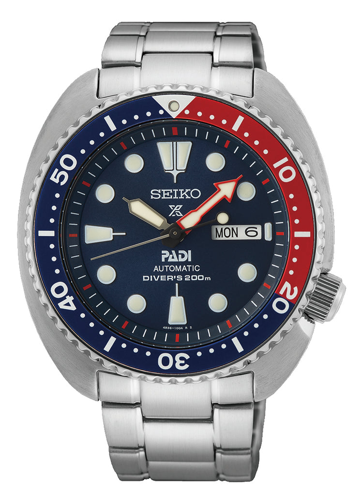 Seiko x PADI automatic mens divers watch.  The watch has a blue dial and a pepsi bezel