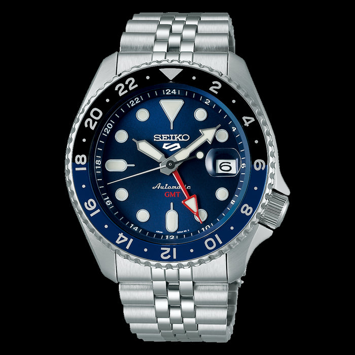 Seiko 5 Sports GMT watch with a blue dial and stainless steel bracelet