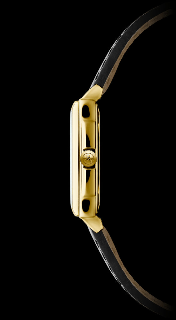 Side view of a gold Raymond Weil watch with leather strap