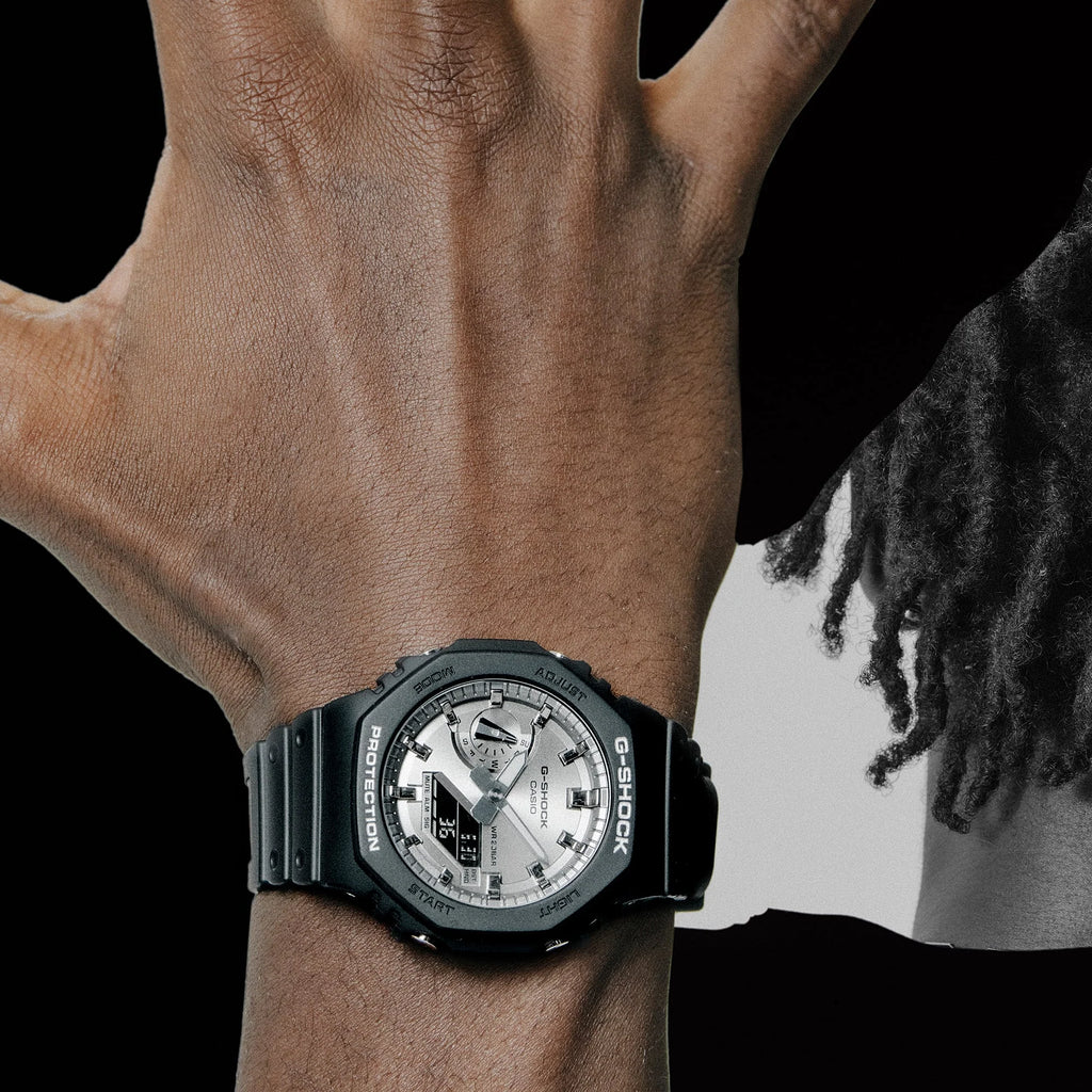 Black G Shock watch with a silver metallic dial