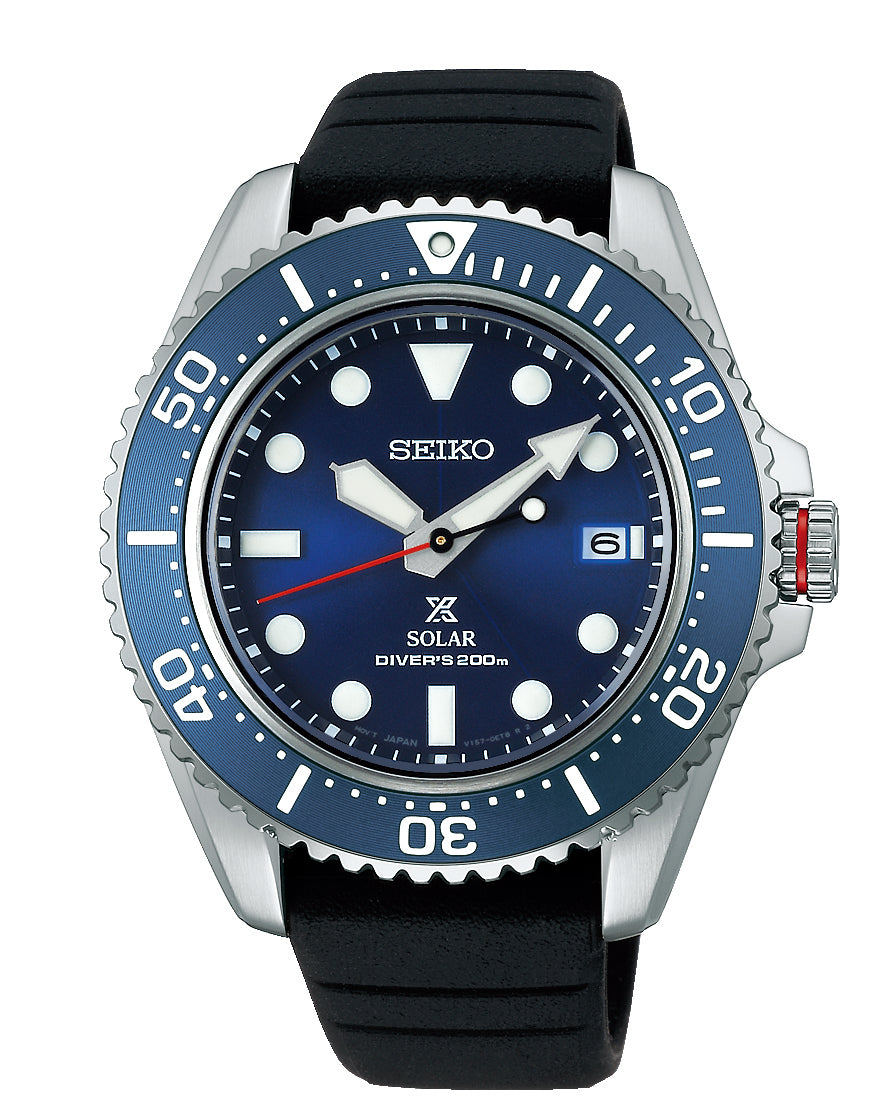 Seiko Prospex solar powered divers watch with a black silicone strap and a blue dial and bezel.