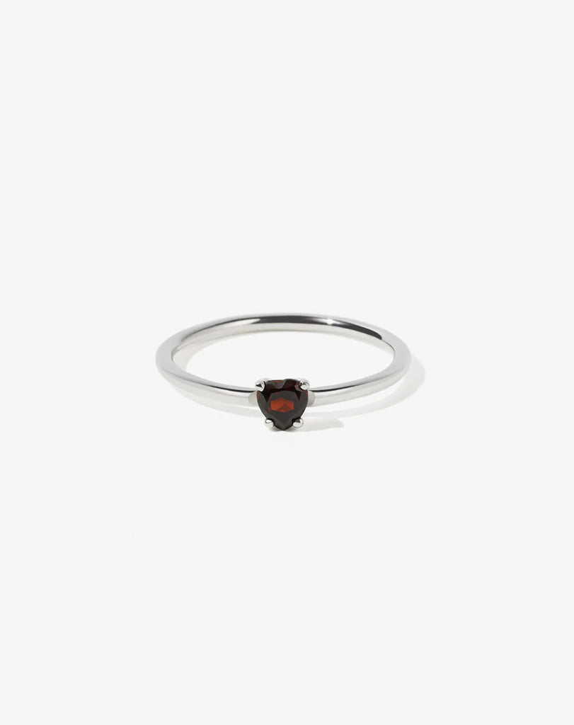 Silver ring with a heart shaped garnet