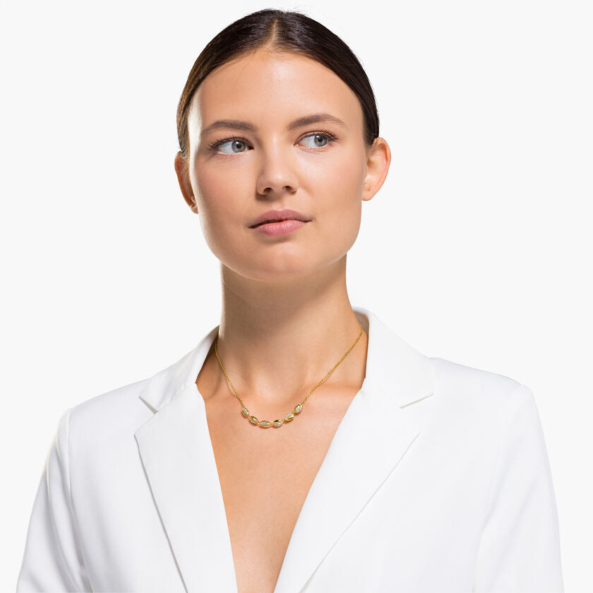 Seashell choker necklace, worn by a model