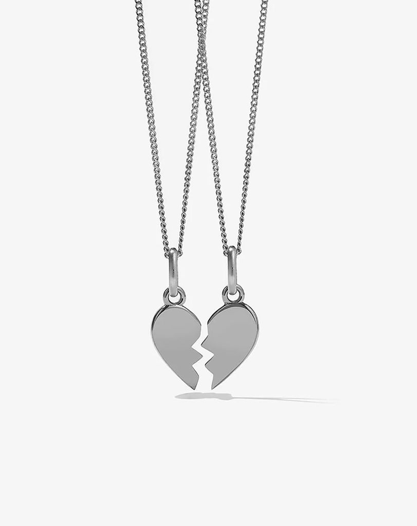 Silver broken heart necklaces to share