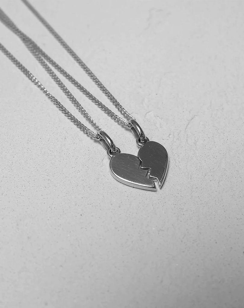 Silver heart necklaces to share