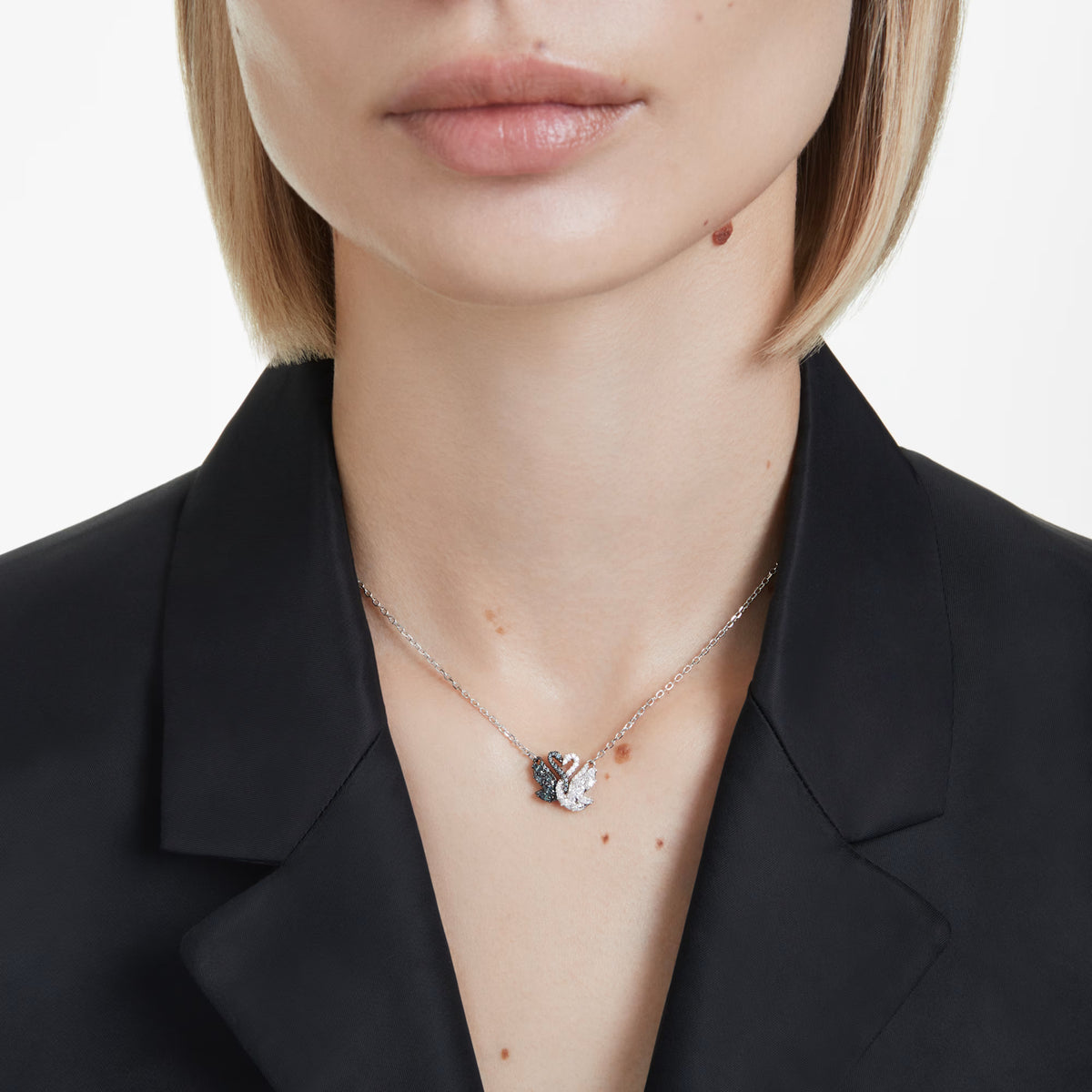 Swarovski Swan pendant, rhodium and ruthenium-plated intertwined swan motif