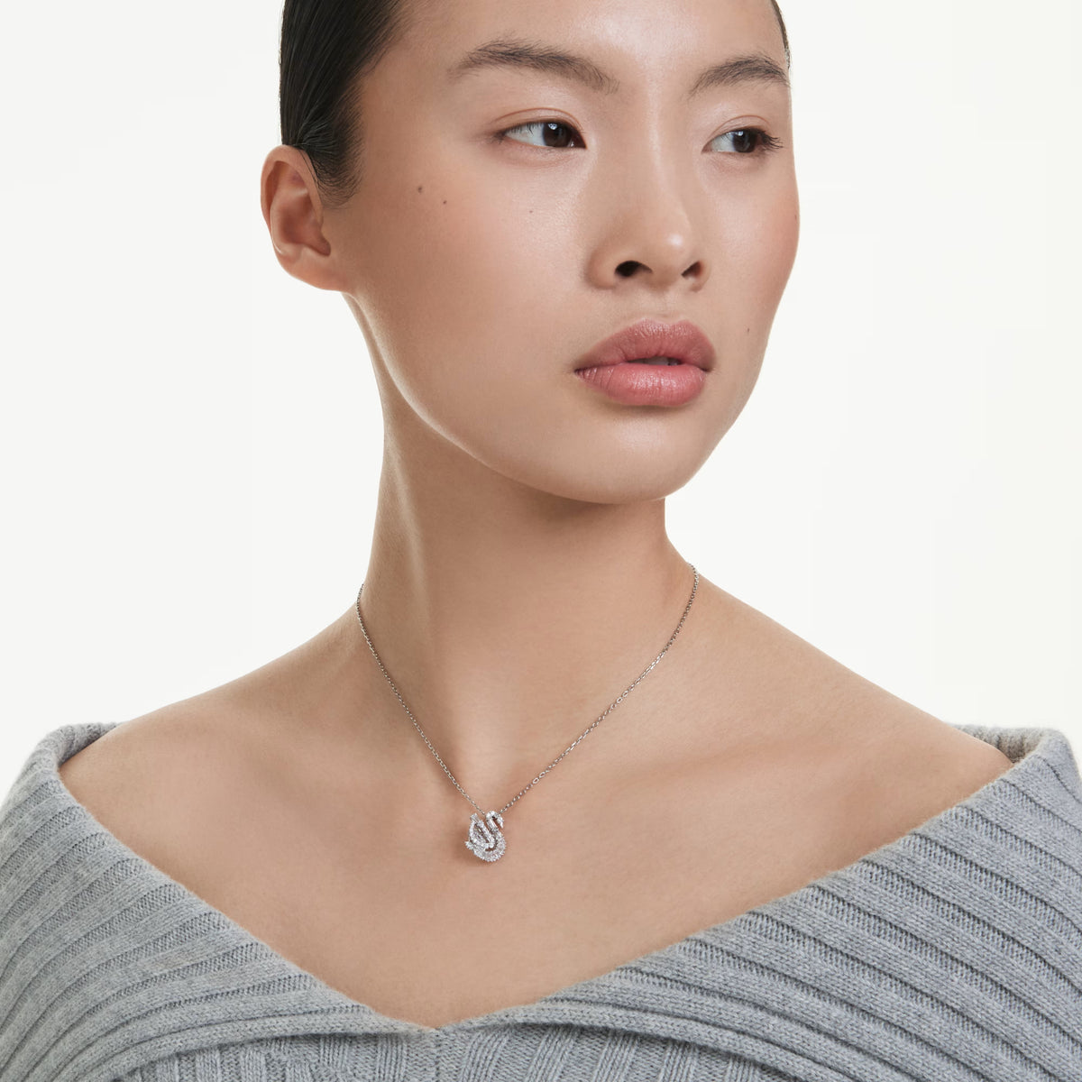 Swarovski Swan pendant, rhodium-plated silhouette with mixed-cut crystal detail