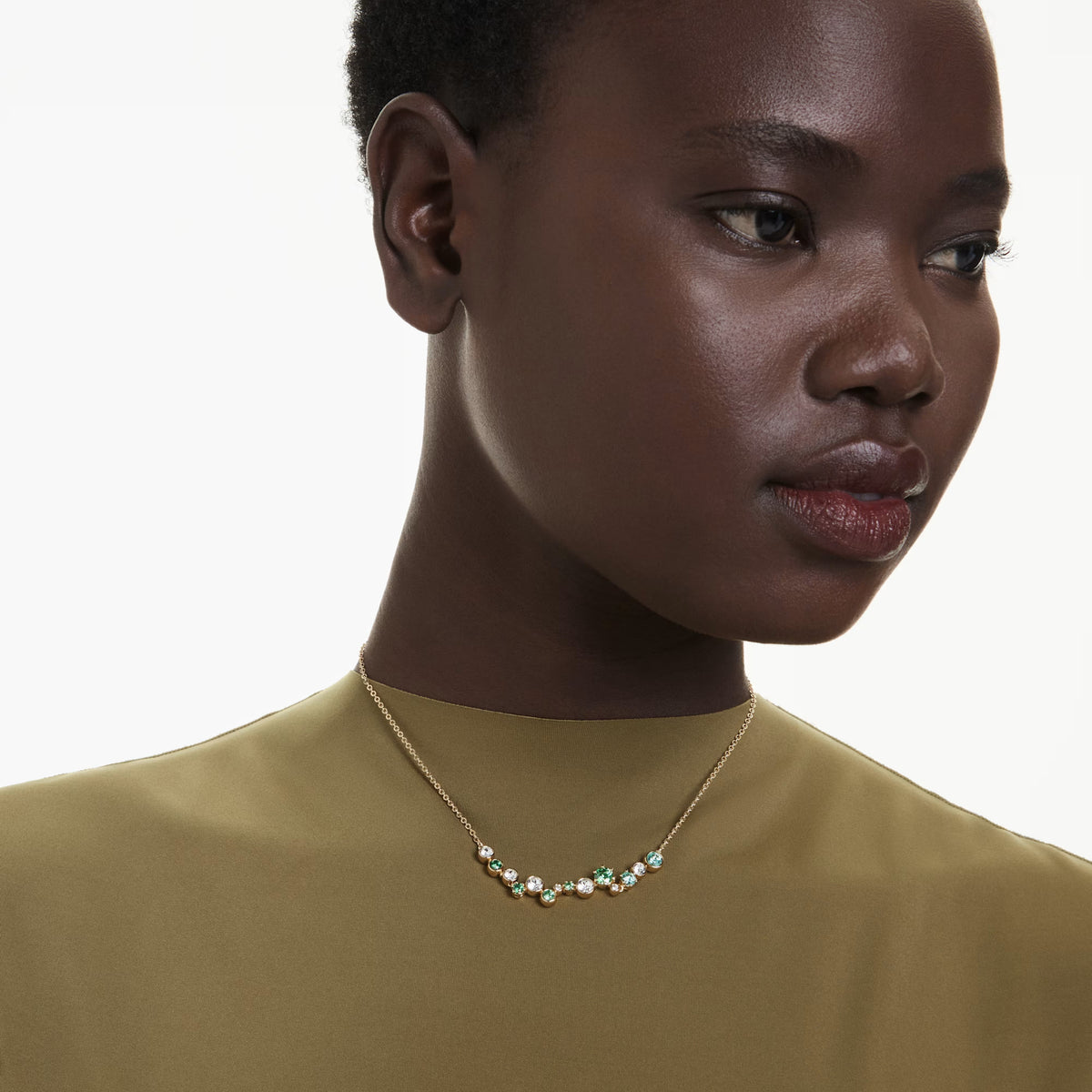 Swarovski Constella necklace, 18K gold finish with clear and green crystal starry design