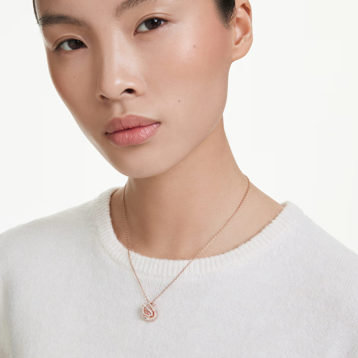 Swarovski Swan pendant, 18K rose gold finish with pink dancing stone swan motif