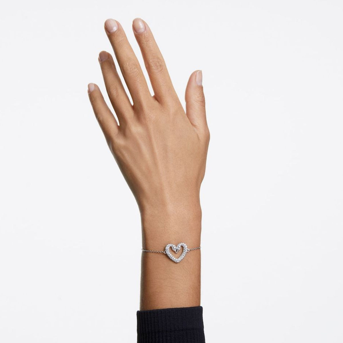 Swarovski Una bracelet, rhodium-plated intertwined swan heart charm with white crystal pavé