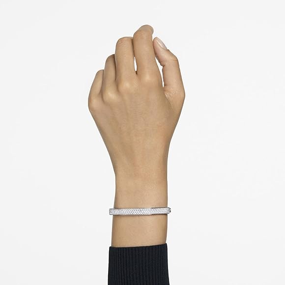 Silver Swarovski Dextera bangle, worn by a model