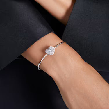 Silver bangle with a heart on it