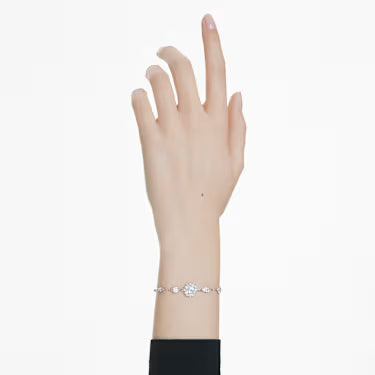 A model is wearing the Swarovski Idyllia snowflake bracelet
