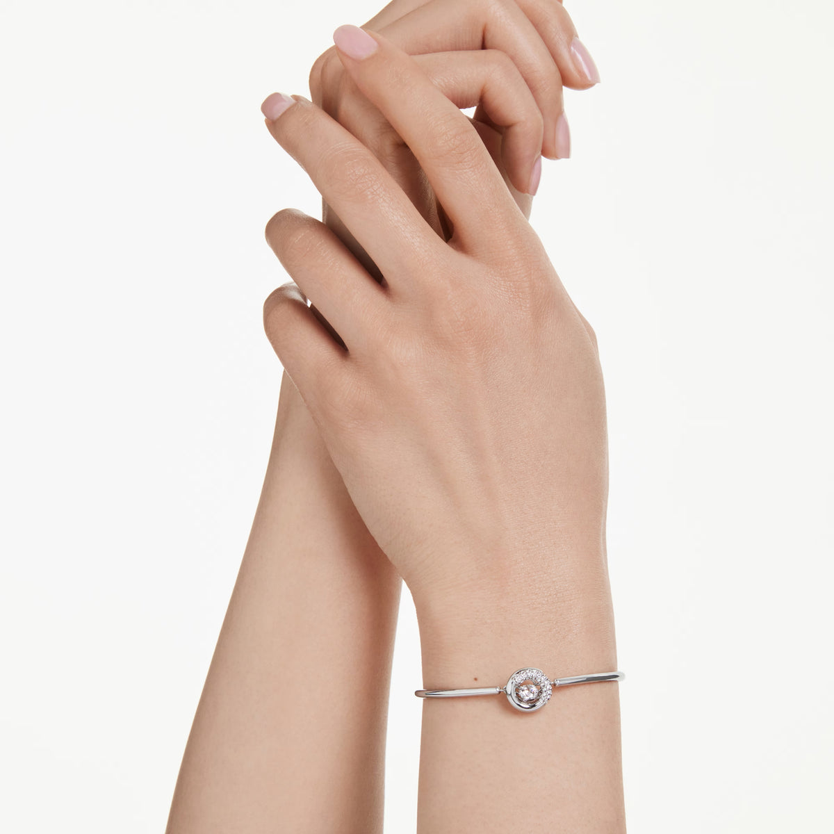 Swarovski Dextera bangle, rhodium-plated hoop with pavé crystals and dancing stone